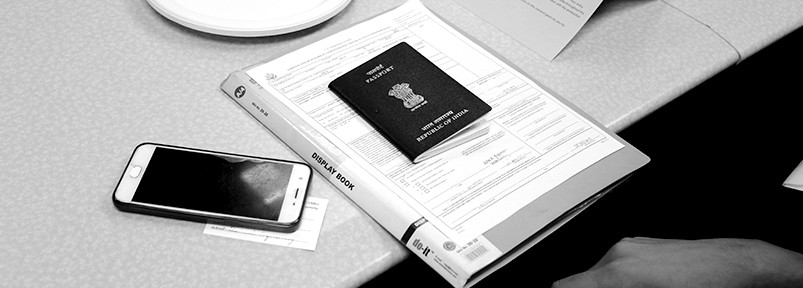 a folder of documents on a table.