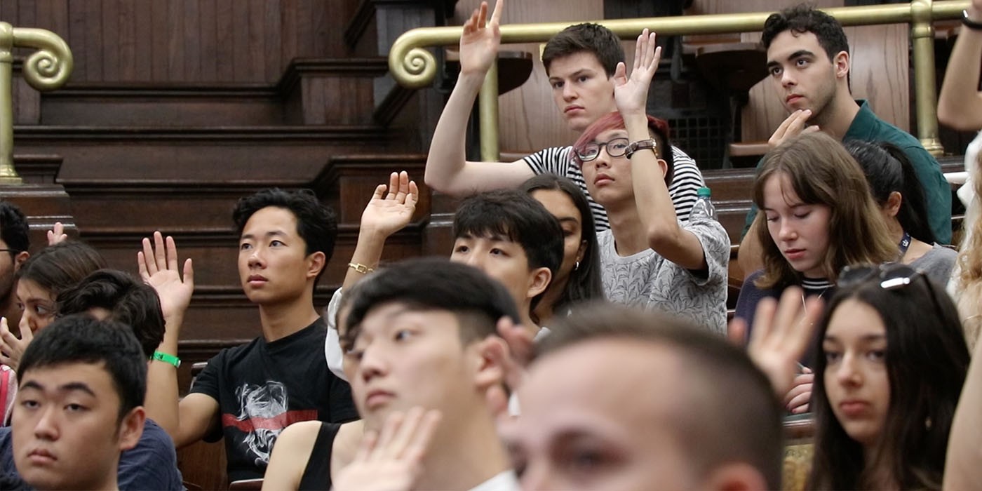 Students raising hands